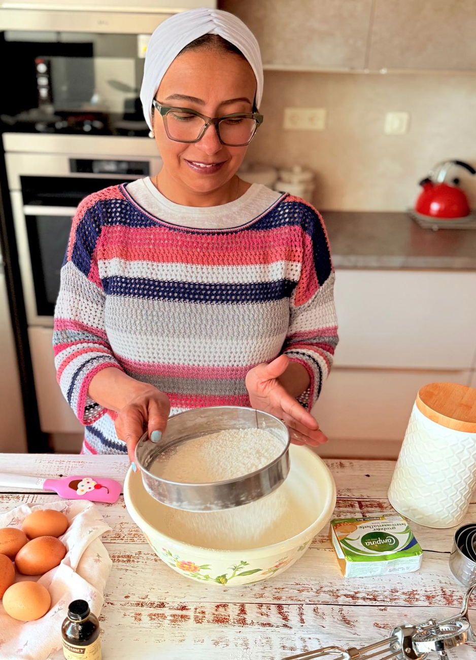 Asmaa preparing delicious pastries in the kitchen